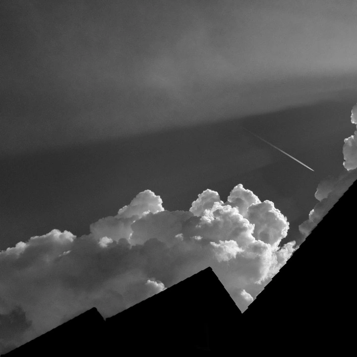 black and white image - Clouds & Rooftops black and white image - Clouds & Rooftops